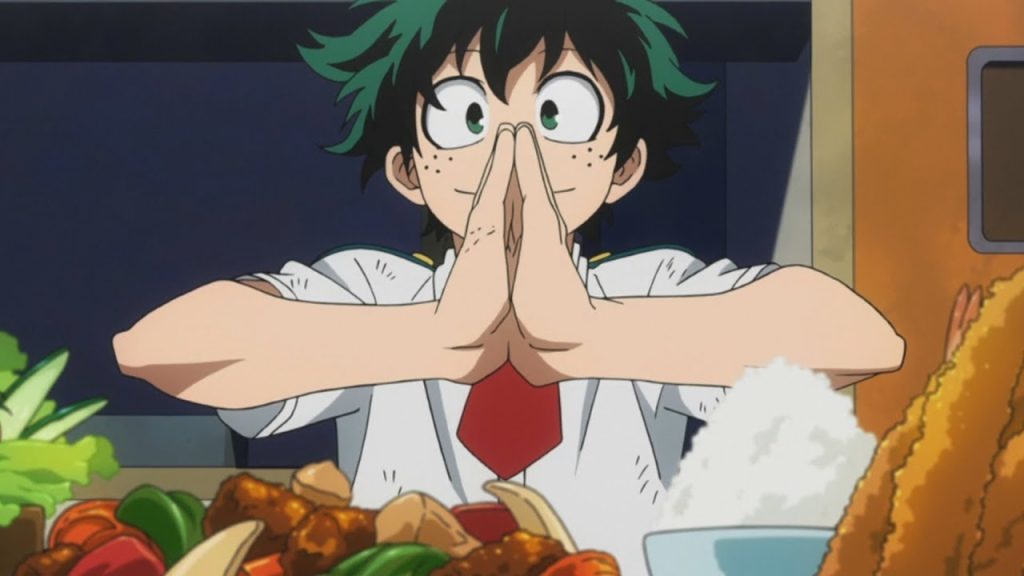 Ejemplo del término itadakimasu. Deku, de Boku no Hero Academia, dando las gracias antes de comer